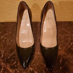 Christian Louboutin Paris pumps in black patent leather with Red Bottoms